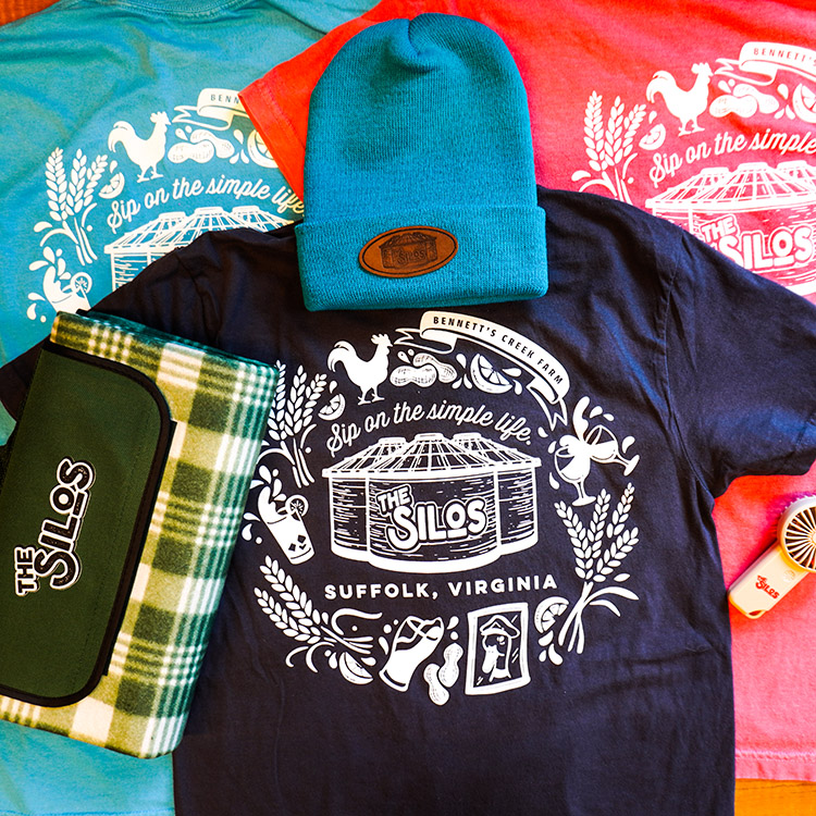 The Silos Merchandice including t-shirts, blanket, beanie hat and personal fan